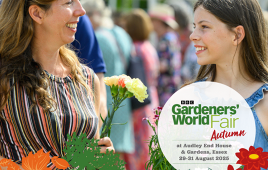 A woman and a child smile at each other, the woman is holding yellow flowers. A circle of text reads ‘BBC Gardeners’ World Fair Autumn at Audley End House and Gardens, Essex 29-31 August 2025’. Along the bottom of the image is illustrated flowers of orange, white and red. A green banner along the bottom with white text reading ‘The Perfect Seasonal Day Out’.